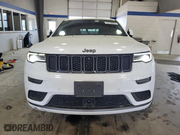 2018 Jeep Grand Cherokee Overland with VIN 1C4RJFCG5JC211145, listed as a Copart auction lot 54138865 with 115,679 mi miles and Salvage title. Bid and sale history available at DreamBid. Image 5.