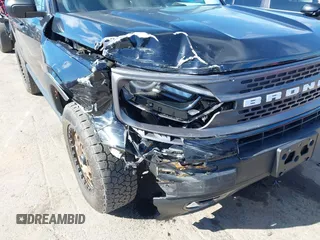 2023 Ford Bronco Sport Badlands z VIN 3FMCR9D95PRD26169, wystawiony jako IAAI lot #41723643 z przebiegiem 21 181 mil mil oraz . Historia ofert i sprzedaży dostępna na DreamBid. Obrazek 6.