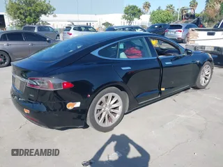 2016 Tesla Model S 90D с VIN 5YJSA1E21GF148336, выставлен на аукционе IAAI как лот 42304073 с пробегом 149 340 миль миль и . История ставок и продаж доступна на DreamBid. Изображение 4.