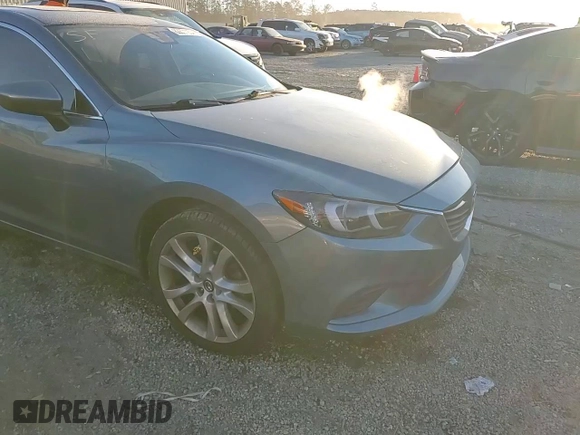2014 Mazda Mazda6 i Touring with VIN JM1GJ1T55E1110567, listed as a Copart auction lot 83671234 with 143,824 mi miles and Salvage Title. Bid and sale history available at carsss.com. Image 13.