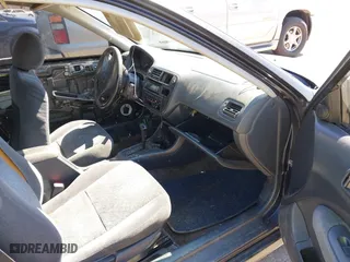 1997 Honda Civic EX with VIN 1HGEJ8245VL054080, listed as a IAAI auction lot 41880386 with 286,568 mi miles. Bid and sale history available at carsss.com. Image 5.
