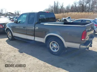 2003 Ford F-150 XL with VIN 1FTRX17L33NB61748, listed as a IAAI auction lot 41789730 with 301,092 mi miles. Bid and sale history available at carsss.com. Image 3.