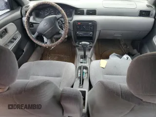 1996 Nissan Sentra XE z VIN 1N4AB41D2TC767557, wystawiony jako Copart lot #42553245 z przebiegiem 148 514 mil mil oraz Szkoda całkowita • Salvage title. Historia ofert i sprzedaży dostępna na DreamBid. Obrazek 8.