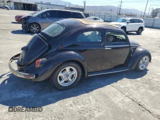 1963 Volkswagen Beetle with VIN 5020781, listed as a Copart auction lot 68491334 with 36,482 mi miles and Salvage Title. Bid and sale history available at DreamBid. Image 3.