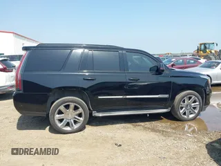 2017 Cadillac Escalade Luxury z VIN 1GYS3BKJ4HR354882, wystawiony jako IAAI lot #41920813 z przebiegiem 122 982 mil mil oraz . Historia ofert i sprzedaży dostępna na DreamBid. Obrazek 13.