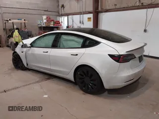 2021 Tesla Model 3 Performance with VIN 5YJ3E1ECXMF991836, listed as a IAAI auction lot 41830519 with Not Provided miles and . Bid and sale history available at carsss.com. Image 3.