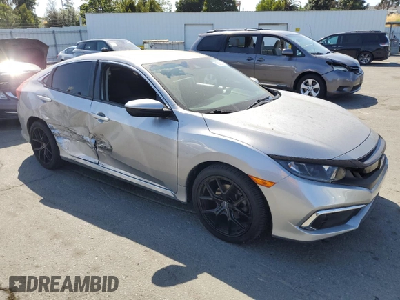 2020 Honda Civic LX z VIN 19XFC2F6XLE209685, wystawiony jako Copart lot #59595335 z przebiegiem Nie podano mil oraz Szkoda całkowita • Salvage title. Historia ofert i sprzedaży dostępna na DreamBid. Obrazek 4.