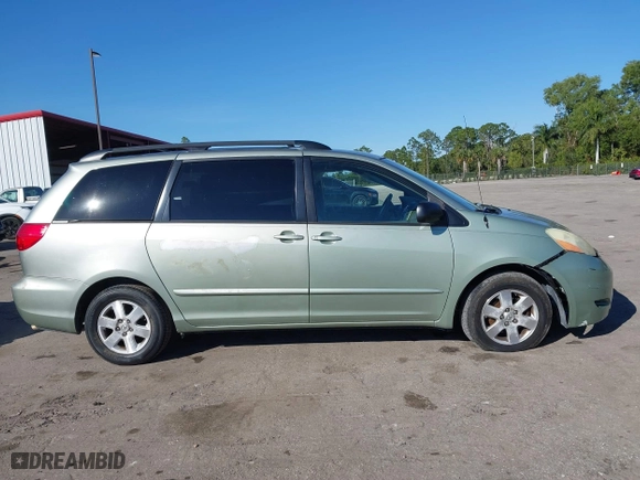 2010 Toyota Sienna CE with VIN 5TDKK4CC2AS329149, listed as a IAAI auction lot 41454554 with 202,599 mi miles. Bid and sale history available at carsss.com. Image 14.