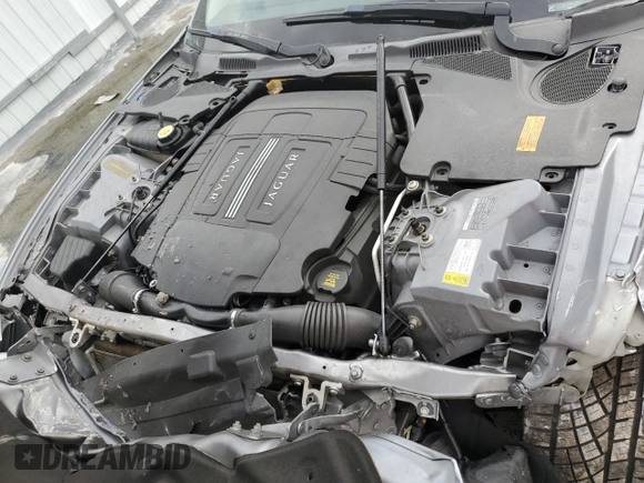 2010 Jaguar XK with VIN SAJWA4GB4ALB37114, listed as a Copart auction lot 77673824 with 99,999 mi miles and Salvage Title. Bid and sale history available at carsss.com. Image 11.