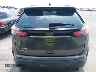2020 Ford Edge SE z VIN 2FMPK3G99LBB59628, wystawiony jako IAAI lot #42403314 z przebiegiem 62 066 mil mil oraz . Historia ofert i sprzedaży dostępna na DreamBid. Obrazek 16.