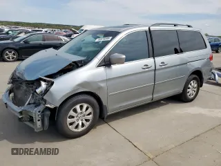 2008 Honda Odyssey EX-L with VIN 5FNRL38758B038063, listed as a Copart auction lot 49976895 with 164,973 mi miles and Clean Title. Bid and sale history available at DreamBid. Image 1.