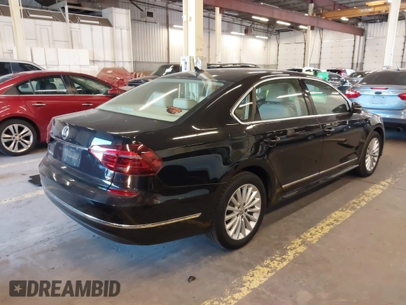 2017 Volkswagen Passat SE with VIN 1VWBT7A30HC019849, listed as a IAAI auction lot 42450723 with 73,236 mi miles and . Bid and sale history available at DreamBid. Image 4.