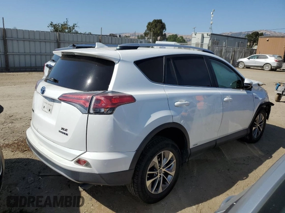2016 Toyota RAV4 Hybrid XLE with VIN JTMRJREV2GD058966, listed as a Copart auction lot 58908824 with 0 mi miles and Salvage Title. Bid and sale history available at carsss.com. Image 3.