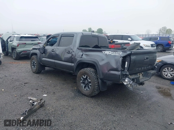 2022 Toyota Tacoma SR with VIN 3TMCZ5AN1NM476353, listed as a IAAI auction lot 41938107 with 51,782 mi miles and . Bid and sale history available at DreamBid. Image 3.