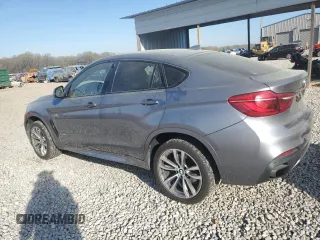 2016 BMW X6 xDrive50i with VIN 5UXKU6C57G0R33958, listed as a Copart auction lot 49774065 with 124,226 mi miles and Salvage Title. Bid and sale history available at carsss.com. Image 2.