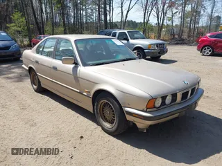 1995 BMW 5 Series 525i z VIN WBAHD6326SGK51720, wystawiony jako IAAI lot #41916040 z przebiegiem 232 337 mil mil oraz . Historia ofert i sprzedaży dostępna na DreamBid. Obrazek 1.