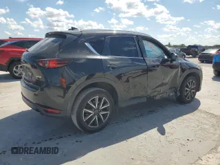 2018 Mazda CX-5 Touring with VIN JM3KFACM0J1408075, listed as a Copart auction lot 50866735 with Not Provided miles and Salvage Title. Bid and sale history available at carsss.com. Image 3.