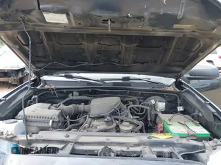 2020 Toyota Tacoma SR with VIN 3TYRX5GN1LT002234, listed as a IAAI auction lot 42082830 with 128,589 mi miles and . Bid and sale history available at DreamBid. Image 10.