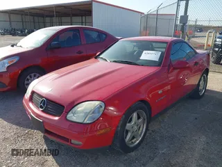 1998 Mercedes-Benz SLK-Class with VIN WDBKK47F7WF058115, listed as a IAAI auction lot 42011747 with 118,423 mi miles. Bid and sale history available at carsss.com. Image 2.