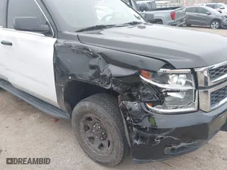 2018 Chevrolet Tahoe Commercial with VIN 1GNLCDEC1JR312458, listed as a IAAI auction lot 41371563 with 114,086 mi miles. Bid and sale history available at carsss.com. Image 6.