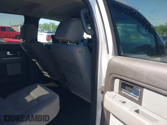 2012 Ford F-150 XL with VIN 1FTFW1CT8CFA09809, listed as a IAAI auction lot 41972801 with 164,245 mi miles. Bid and sale history available at carsss.com. Image 8.