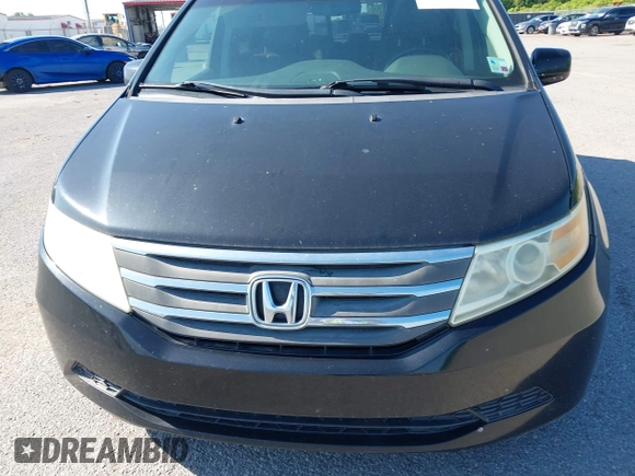 2011 Honda Odyssey EX-L with VIN 5FNRL5H66BB058333, listed as a IAAI auction lot 42172045 with 215,723 mi miles and . Bid and sale history available at carsss.com. Image 6.