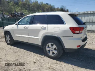 2011 Jeep Grand Cherokee Laredo with VIN 1J4RR4GG8BC724196, listed as a Copart auction lot 51760195 with 79,407 mi miles and Salvage Title. Bid and sale history available at DreamBid. Image 2.