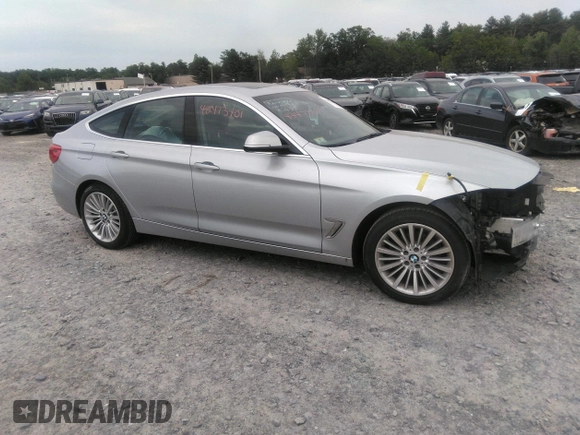 2014 BMW 3 Series 328i Gran Turismo xDrive z VIN WBA3X5C58ED558625, wystawiony jako IAAI lot #42473401 z przebiegiem 106 419 mil mil oraz . Historia ofert i sprzedaży dostępna na DreamBid. Obrazek 1.