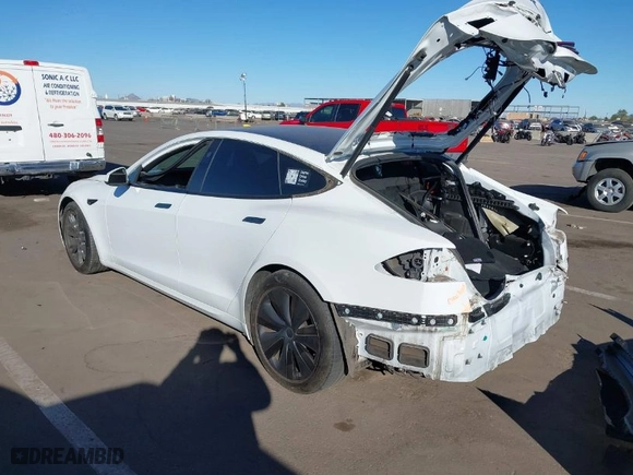2022 Tesla Model S Plaid with VIN 5YJSA1E64NF479959, listed as a IAAI auction lot 41057673 with 27,203 mi miles. Bid and sale history available at carsss.com. Image 3.