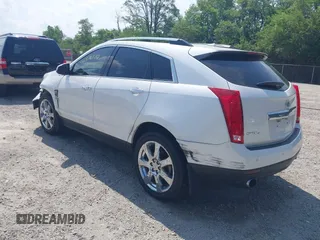 2010 Cadillac SRX Premium Collection with VIN 3GYFNFEY1AS575046, listed as a IAAI auction lot 42576770 with 135,129 mi miles and . Bid and sale history available at DreamBid. Image 3.