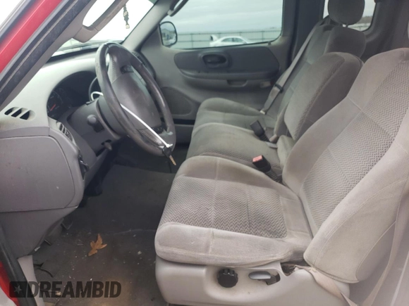 2002 Ford F-150 XL with VIN 1FTRX17W12NB06157, listed as a Copart auction lot 51209485 with 167,953 mi miles and Salvage Title. Bid and sale history available at carsss.com. Image 7.