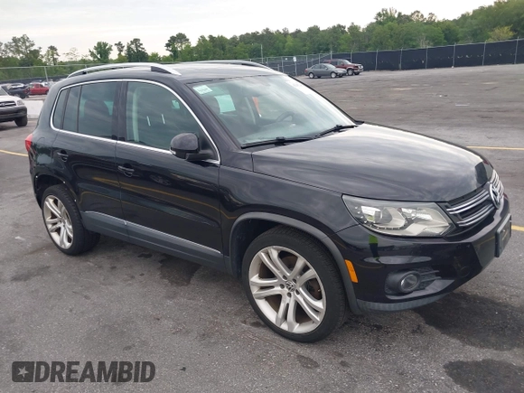 2012 Volkswagen Tiguan S with VIN WVGBV7AX6CW592242, listed as a IAAI auction lot 42215240 with 158,852 mi miles and . Bid and sale history available at DreamBid. Image 1.