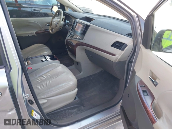 2011 Toyota Sienna XLE AAS with VIN 5TDYK3DC1BS007820, listed as a IAAI auction lot 41935200 with 123,554 mi miles. Bid and sale history available at carsss.com. Image 5.
