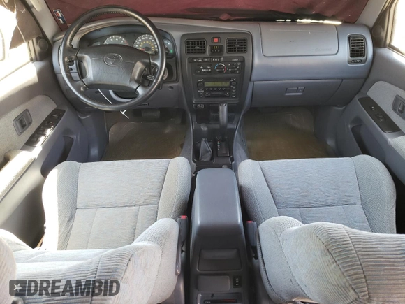 2000 Toyota 4Runner SR5 z VIN JT3HN86R0Y0298459, wystawiony jako Copart lot #58188415 z przebiegiem 138 312 mil mil oraz Czysty tytuł • Clean title. Historia ofert i sprzedaży dostępna na DreamBid. Obrazek 8.