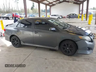 2009 Toyota Corolla with VIN 1NXBU40E29Z028660, listed as a IAAI auction lot 42025186 with 218,285 mi miles. Bid and sale history available at carsss.com. Image 13.