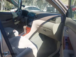 2007 Toyota Corolla CE with VIN 1NXBR32E17Z925975, listed as a IAAI auction lot 41829465 with 180,769 mi miles. Bid and sale history available at carsss.com. Image 5.