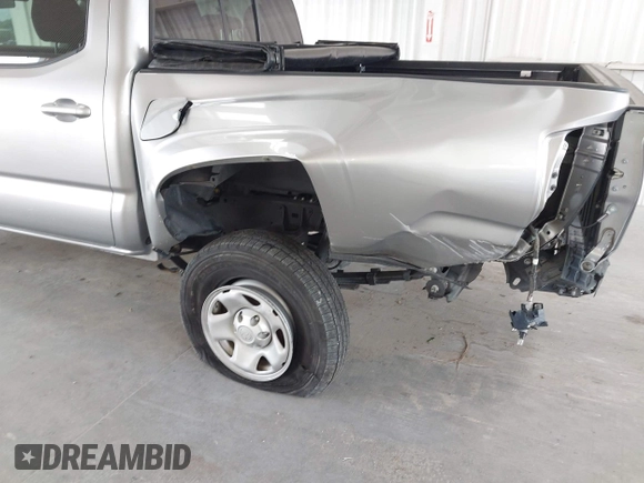 2021 Toyota Tacoma SR with VIN 3TYAX5GN9MT019636, listed as a IAAI auction lot 42497197 with 48,041 mi miles and . Bid and sale history available at DreamBid. Image 6.