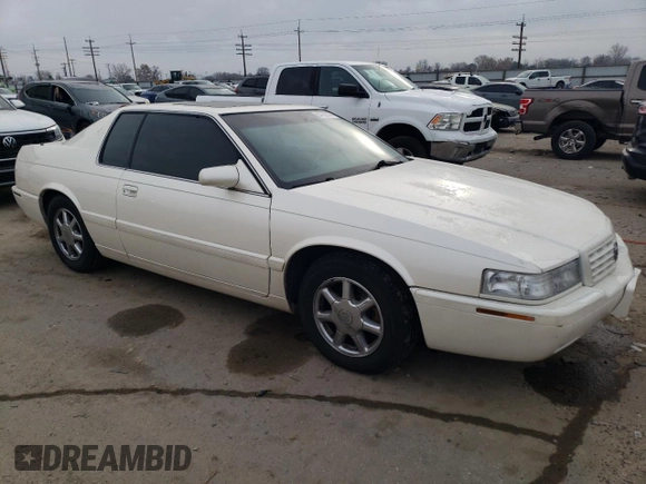 2001 Cadillac Eldorado Touring ETC z VIN 1G6ET12921B103685, wystawiony jako Copart lot #84565144 z przebiegiem 99 265 mil mil oraz Szkoda całkowita • Salvage title. Historia ofert i sprzedaży dostępna na DreamBid. Obrazek 4.