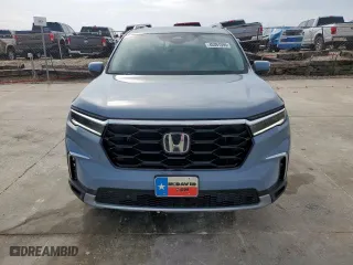 2025 Honda Pilot Touring with VIN 5FNYG2H78SB000571, listed as a Copart auction lot 45391595 with 6,916 mi miles and Salvage Title. Bid and sale history available at carsss.com. Image 5.
