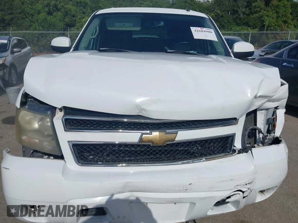 2007 Chevrolet Tahoe LT with VIN 1GNFC13J97R314853, listed as a IAAI auction lot 42684980 with 312,399 mi miles and . Bid and sale history available at DreamBid. Image 10.