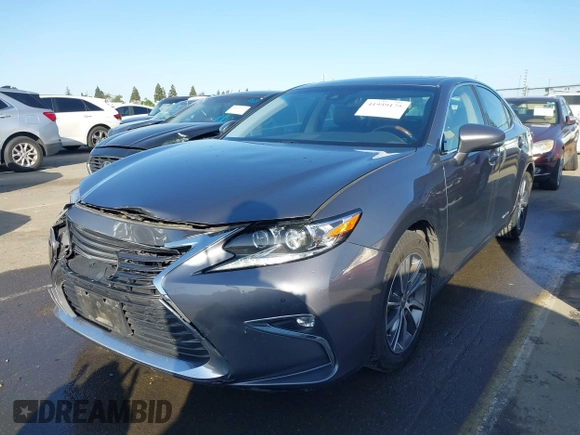 2016 Lexus ES 300h z VIN JTHBW1GG6G2108510, wystawiony jako IAAI lot #41959175 z przebiegiem 142 882 mil mil oraz . Historia ofert i sprzedaży dostępna na DreamBid. Obrazek 19.