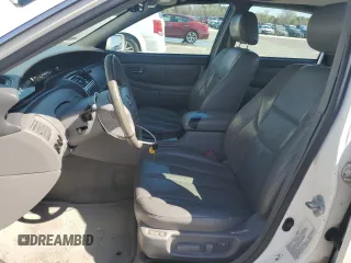 2002 Toyota Avalon XL z VIN 4T1BF28BX2U250961, wystawiony jako Copart lot #50400245 z przebiegiem 351 091 mil mil oraz Szkoda całkowita • Salvage title. Historia ofert i sprzedaży dostępna na DreamBid. Obrazek 7.