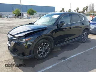 2023 Mazda CX-5 2.5 S Premium Package with VIN JM3KFBDM4P0266378, listed as a IAAI auction lot 41655712 with 31,746 mi miles. Bid and sale history available at carsss.com. Image 17.