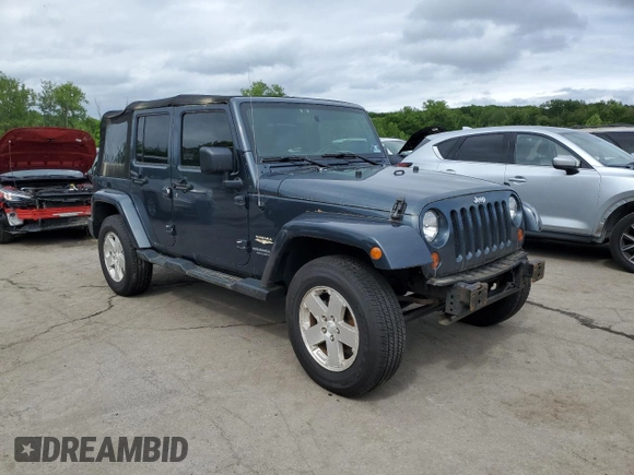 2008 Jeep Wrangler Unlimited Sahara with VIN 1J4GA59108L562831, listed as a Copart auction lot 58949225 with 206,312 mi miles and Clean title. Bid and sale history available at DreamBid. Image 4.