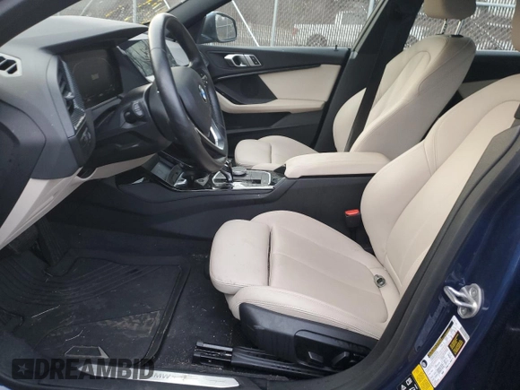 2023 BMW 2 Series 228i xDrive with VIN WBA73AK00P7M34880, listed as a Copart auction lot 77828404 with 8,726 mi miles and Salvage Title. Bid and sale history available at carsss.com. Image 7.
