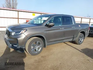2022 Honda Ridgeline RTL-E with VIN 5FPYK3F7XNB024552, listed as a IAAI auction lot 41998613 with 16,846 mi miles and . Bid and sale history available at DreamBid. Image 17.