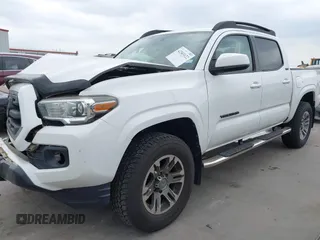 2016 Toyota Tacoma SR5 z VIN 5TFAZ5CN5GX018977, wystawiony jako IAAI lot #42303122 z przebiegiem 99 545 mil mil oraz . Historia ofert i sprzedaży dostępna na DreamBid. Obrazek 17.