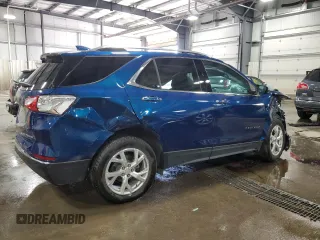 2020 Chevrolet Equinox Premier z VIN 2GNAXXEV0L6273682, wystawiony jako Copart lot #55155065 z przebiegiem 71 754 mil mil oraz Szkoda całkowita • Salvage title. Historia ofert i sprzedaży dostępna na DreamBid. Obrazek 3.