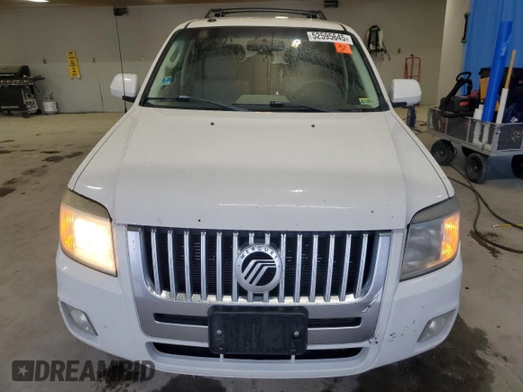 2009 Mercury Mariner Premier z VIN 4M2CU87779KJ12650, wystawiony jako Copart lot #52595645 z przebiegiem 225 939 mil mil oraz Szkoda całkowita • Salvage title. Historia ofert i sprzedaży dostępna na DreamBid. Obrazek 5.