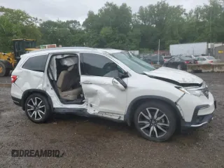 2021 Honda Pilot Touring 7-Passenger z VIN 5FNYF6H64MB004962, wystawiony jako Copart lot #57860225 z przebiegiem 52 311 mil mil oraz Szkoda całkowita • Salvage title. Historia ofert i sprzedaży dostępna na DreamBid. Obrazek 4.